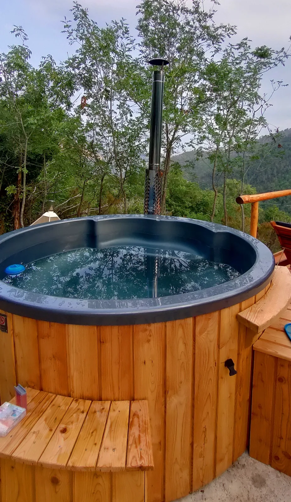 Outdoor Norwegian hot tub among the trees